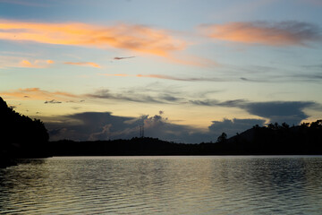 Golden hour sunrise in Kenyir Lake, Terengganu, Malaysia.