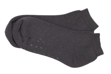 Socks isolated. Closeup of a pair of black warm wool socks for cold winter isolated on a white background. Macro photgraph.