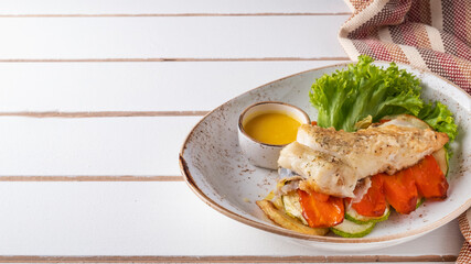 ?od fillet with vegetables. Fish dish. Copy space