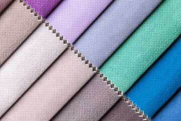 Sample of velvet textile various colors, cloth background.