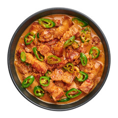 Bicol Express Stew in black bowl isolated on white. Filipino cuisine spicy pork belly coconut milk curry. Asian food.