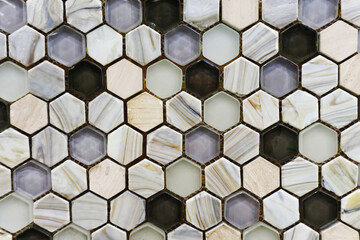 Marble tiles in the form of honeycombs. Stone background for designer