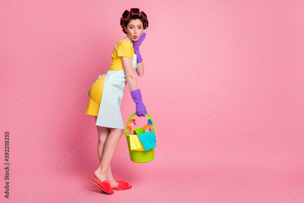 Sticker Full body photo of amazed wife touch gloves face hold bucket wear dotted dress slippers isolated on pastel color background