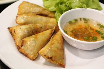 Vietnam food - deep fried spring rolls – and sweet sauce at Hoi an vietnam