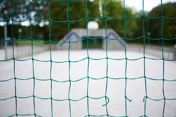 a blue net at a soccer playground