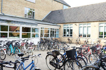A bicycle parking spot at a school yard