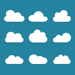 White cartoon clouds set isolated on blue background. Collection of different cartoon clouds for background template, wallpaper and sky design. Cartoon clouds vector. Sky illustration