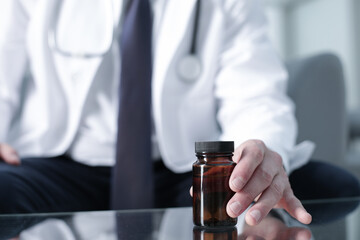 Doctor working in the clinic consults the patient