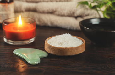 Obraz na płótnie Canvas Table with essential oil and salt. Spa and massage concept.