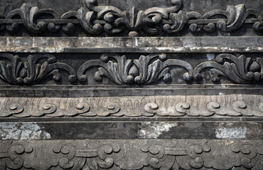 Surface Ancient Sculpture Black wall of Royal Tomb of Khai Dinh King architecture of the city of Hue Vietnam   