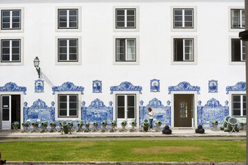 azulejos panels and collection of cannons in the courtyard of the Lisbon Military Museum