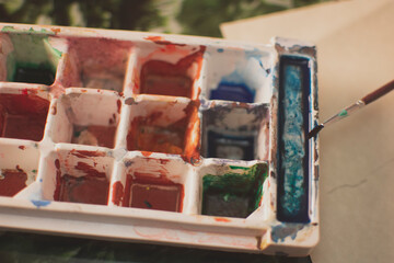 brush and paint on the table