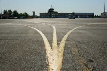 Marking the road at the airport. Three divergent line