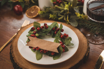 Christmas table setting with decorations and candles	