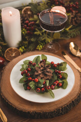 Christmas table setting with decorations and candles	