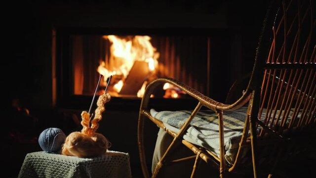 Place for a warm winter evening - rocking chair and needlework set