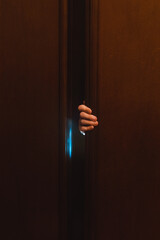 Hiding behind the door
