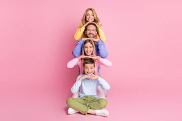 Full body photo positive pile stack face mom dad small girl boy sit floor with crossed legs isolated on pastel color background