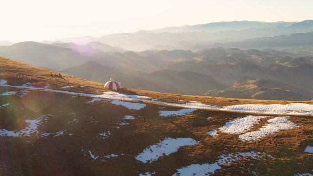 Drone 4k clip of Batrana mountain refuge high at 2170m in Bucegi Mountains, Romania, on a beautiful autumn day