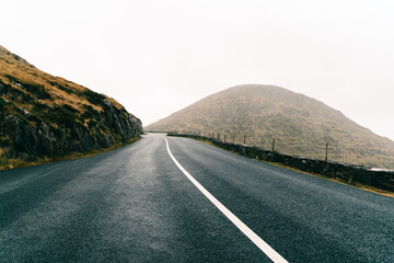 Misty Lonely Road in the Wild Atlantic Way of Ireland