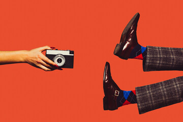 Camera and shoes. Modern art collage in pop-art style. Hands and legs isolated on trendy colored background with copyspace, contrast. Modern design with copyspace for advertising. Trendy colors.