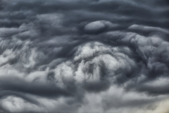 Dark gray stormy clouds. Stormy clouds wallpaper for design. Dark cloudscape overlay for Photoshop