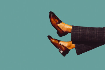 Stylish shoes, outfit. Modern art collage in pop-art style. Legs isolated on trendy colored background with copyspace, contrast. Modern design with copyspace for advertising. Trendy colors.