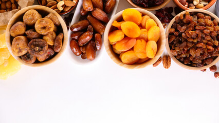 assorted of nuts and dried fruit frame on white background