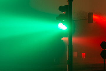 traffic lights in a foggy night