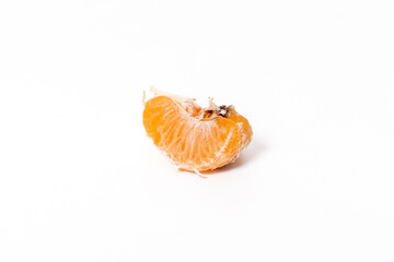 Bad moldy mandarin isolated on white background