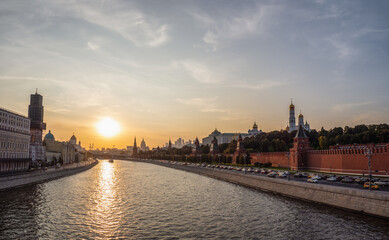 Beautiful evening view of the Moscow river and the architectural complex of the Moscow Kremlin.