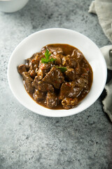 Traditional homemade beef ragout with fresh parsley