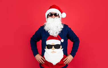 happy bearded man in santa claus costume celebrate winter holiday of chistmas and feel merry about xmas gifts, christmas party