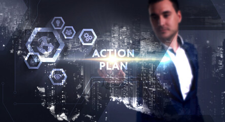 Business, Technology, Internet and network concept. Young businessman working on a virtual screen of the future and sees the inscription: Action plan