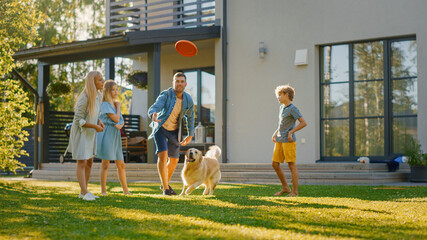 Smiling Beautiful Family of Four Play Fetch flying disc with Happy Golden Retriever Dog on the...