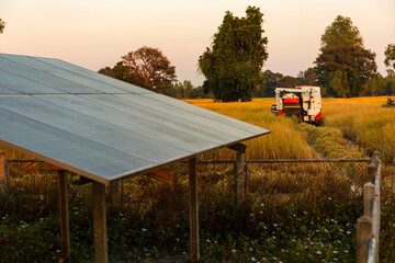 agricultural equipment for field irrigation, water jet, behind which is solar panel's,