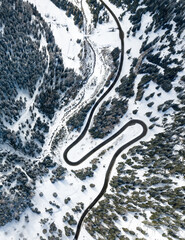 Aerial view by drone on the most spectacular pass road in Swiss Alps - Maloja Pass in Grison, Switzerland