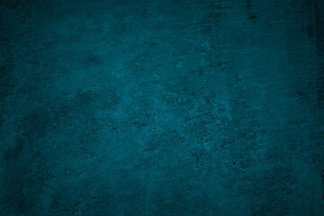 Blue green grunge background. Dark abstract rough background. Toned concrete wall texture....