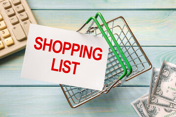 Shopping basket and text SHOPPING LIST on white paper note list.