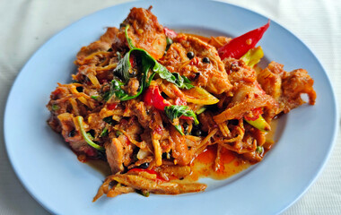 Stir fried spicy wild boar with red curry. Authentic Thai food.