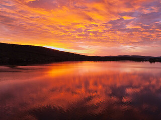 Sunset sky over a beautiful lake in the summer