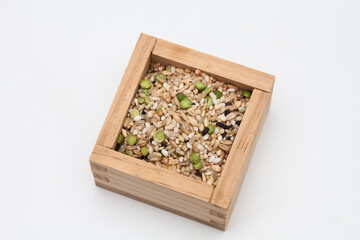 Miscellaneous grains in measure wooden cup