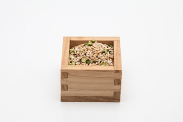 Miscellaneous grains in measure wooden cup