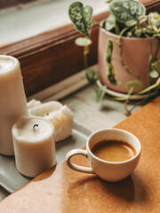 Obraz na płótnie Canvas Coffee cup and candles