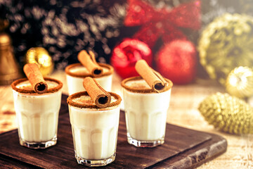 hot eggnog typical of Christmas, made at home all over the world, based on eggs and alcohol. called...