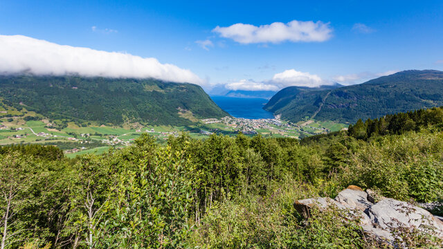 Mountains valley with village Vik on fjord, Norway