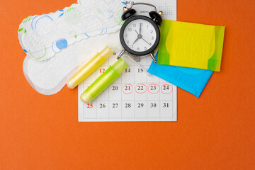 Menstruation calendar with sanitary pads and tampons, pills