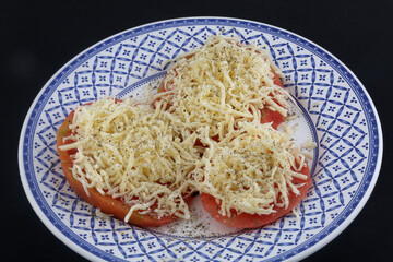tomato with mozarella as vegan dish