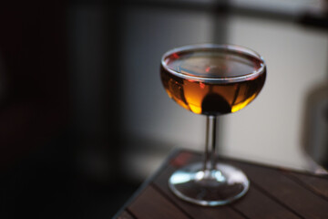 Whisky cocktail in vintage glass manhattan black cherry
