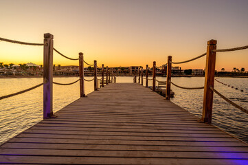Obraz premium Wooden Pier on Red Sea in Hurghada at sunset, View of the promenade boardwalk - Egypt, Africa